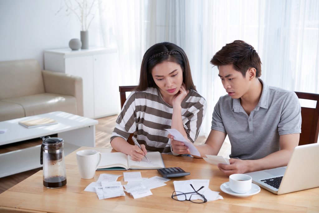 Man Woman Calculating Domestic Budget Home 1024x683