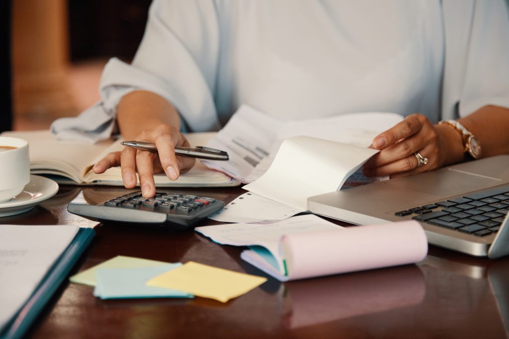 Entrepreneur Working With Bills 2 1024x683