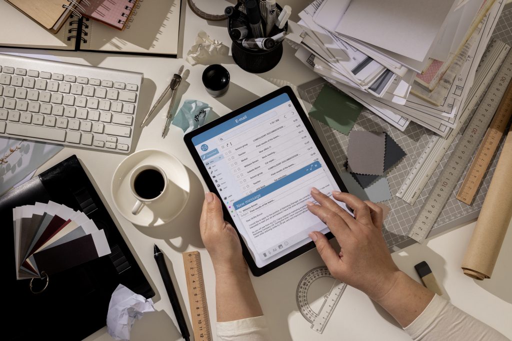 Top View Messy Office Workspace With Tablet 1 1024x683
